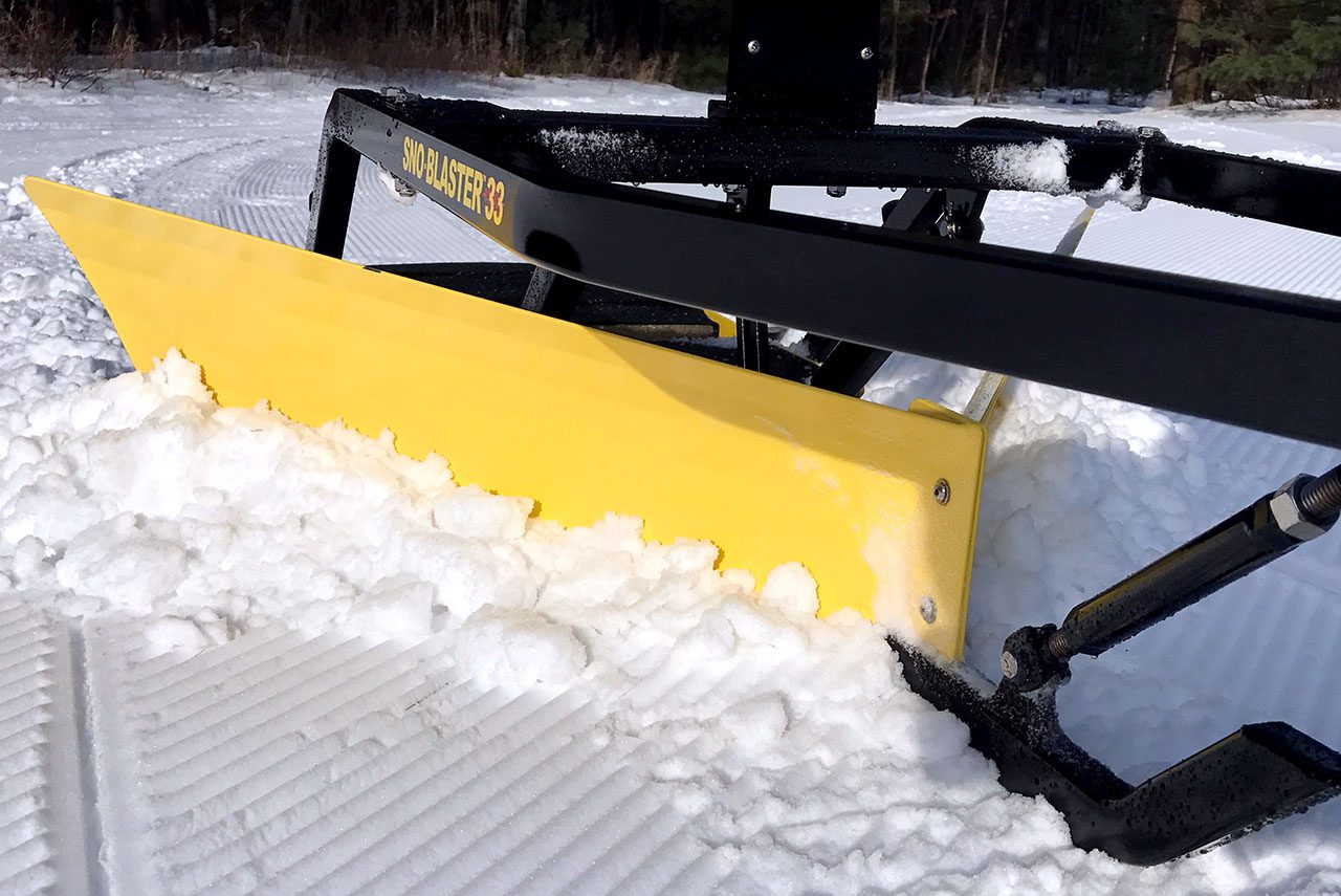 snow groomer side view